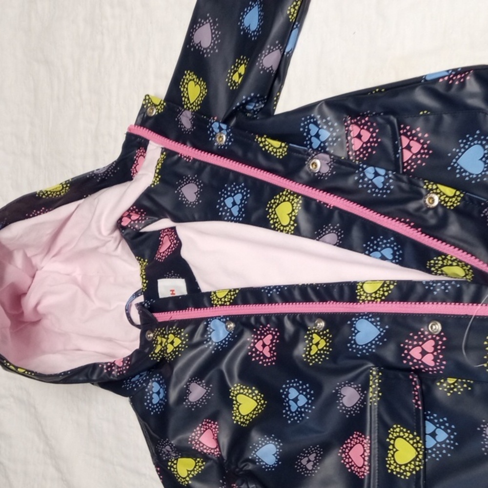 Joe Fresh new girl's lined raincoat. Colored heart design in blue, yellow, grey